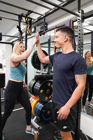 Male and female training in the fitness centre at Victoria Park Pool