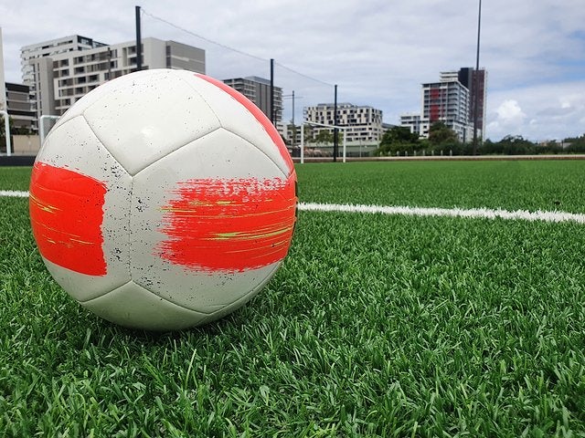 Soccer ball sitting on Gunyama Park sports field