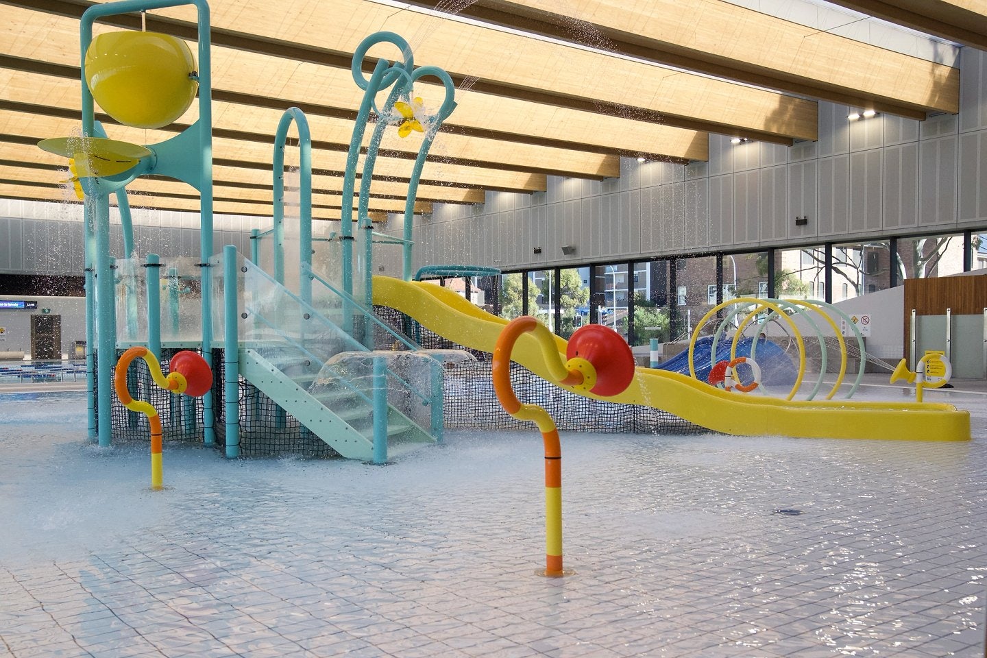 Kids aqua play and waterslides at Gunyama Park Aquatic and Recreation Centre